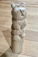 Small bear whittled from a piece of basswood.